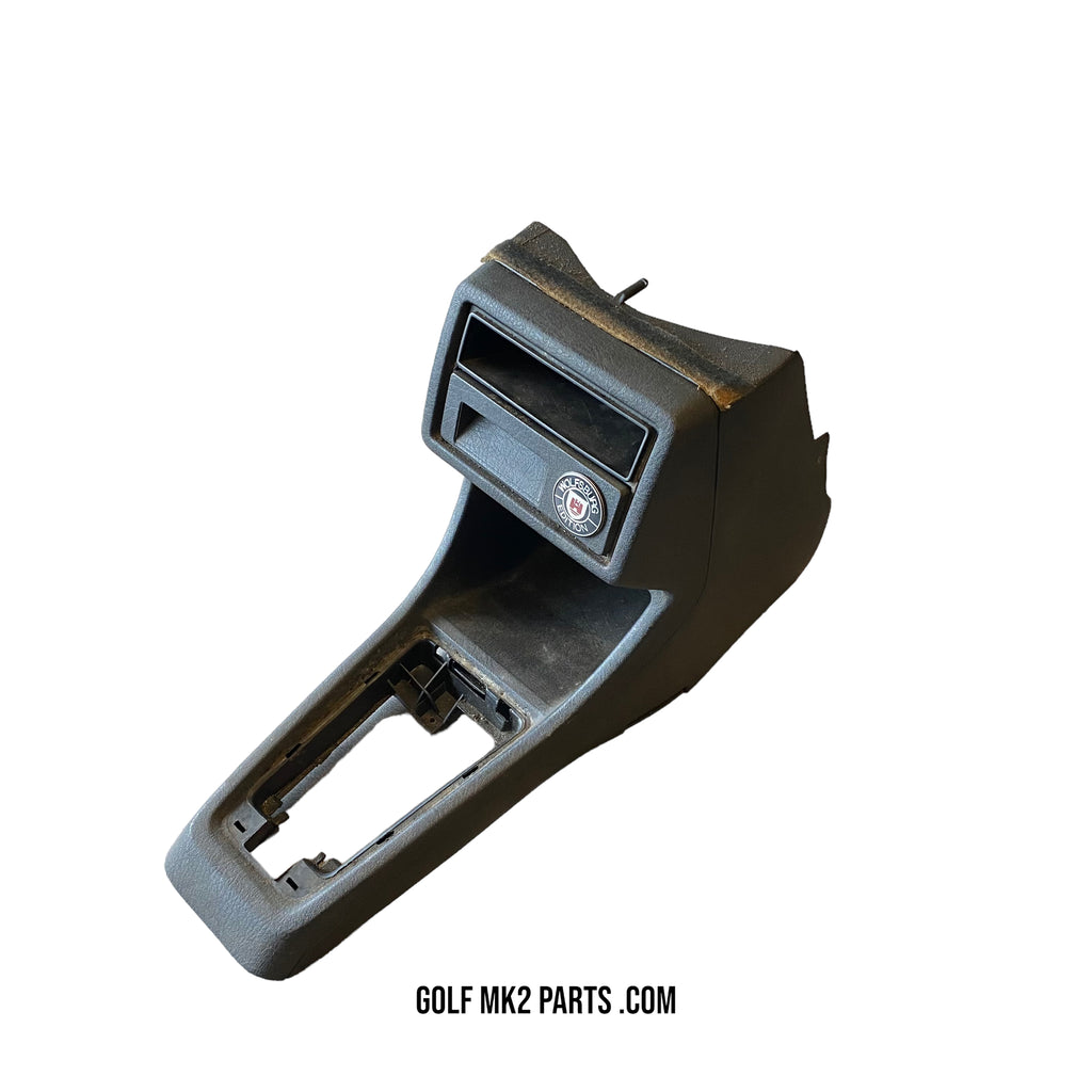 Center console black with Wolfsburg Edition badge