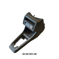 Center console black with Wolfsburg Edition badge