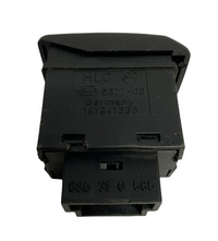 Headlight leveling switch